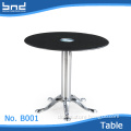 Round dining table with glass top